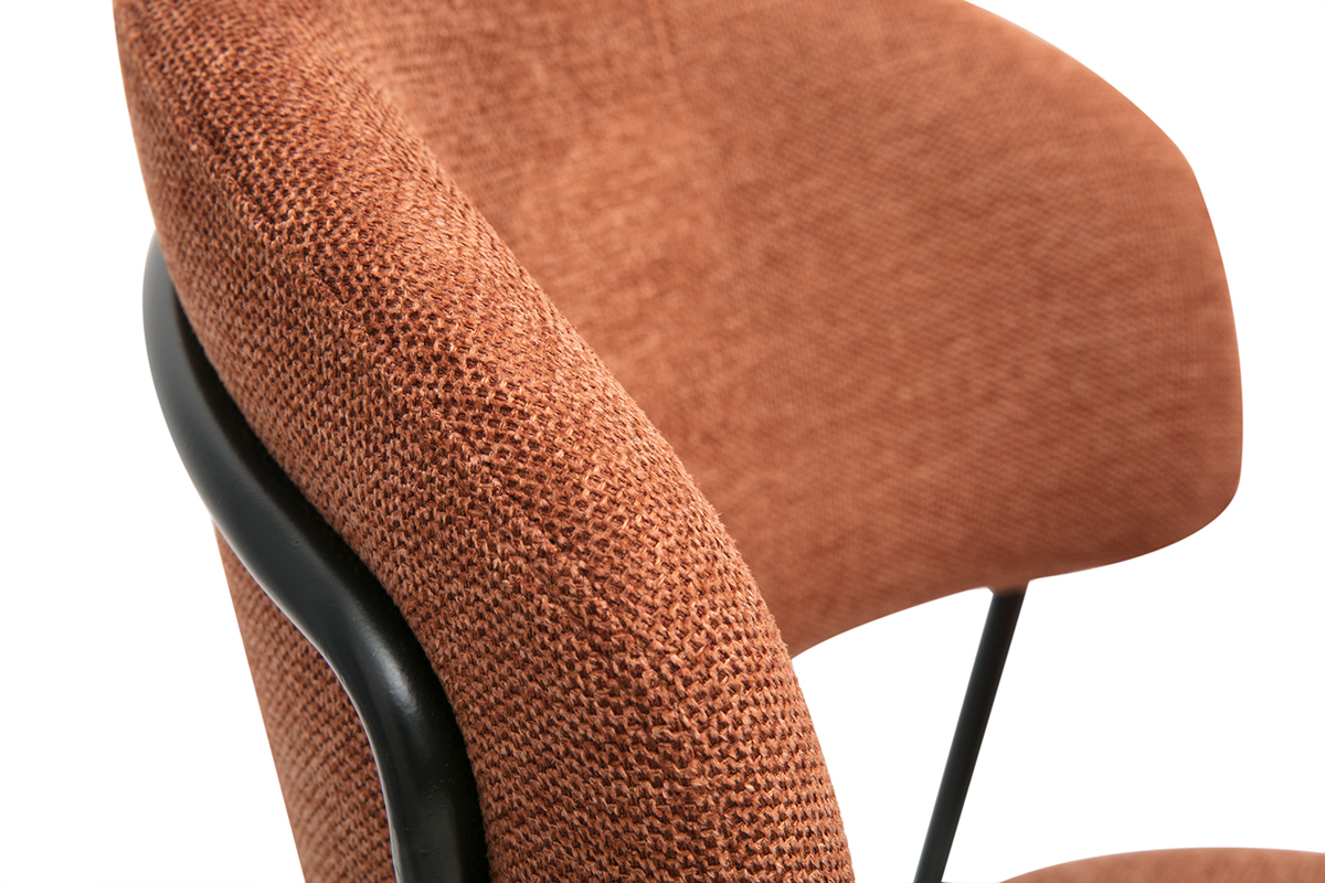 Gros plan sur la texture velours d'une chaise avec pi�tement en m�tal noir.