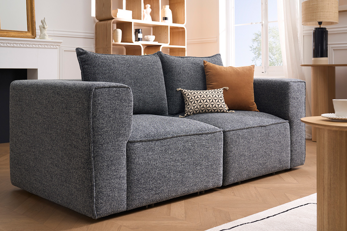 Module d'angle droit KERRY en tissu gris, avec coussin sur canap�, vue de profil.