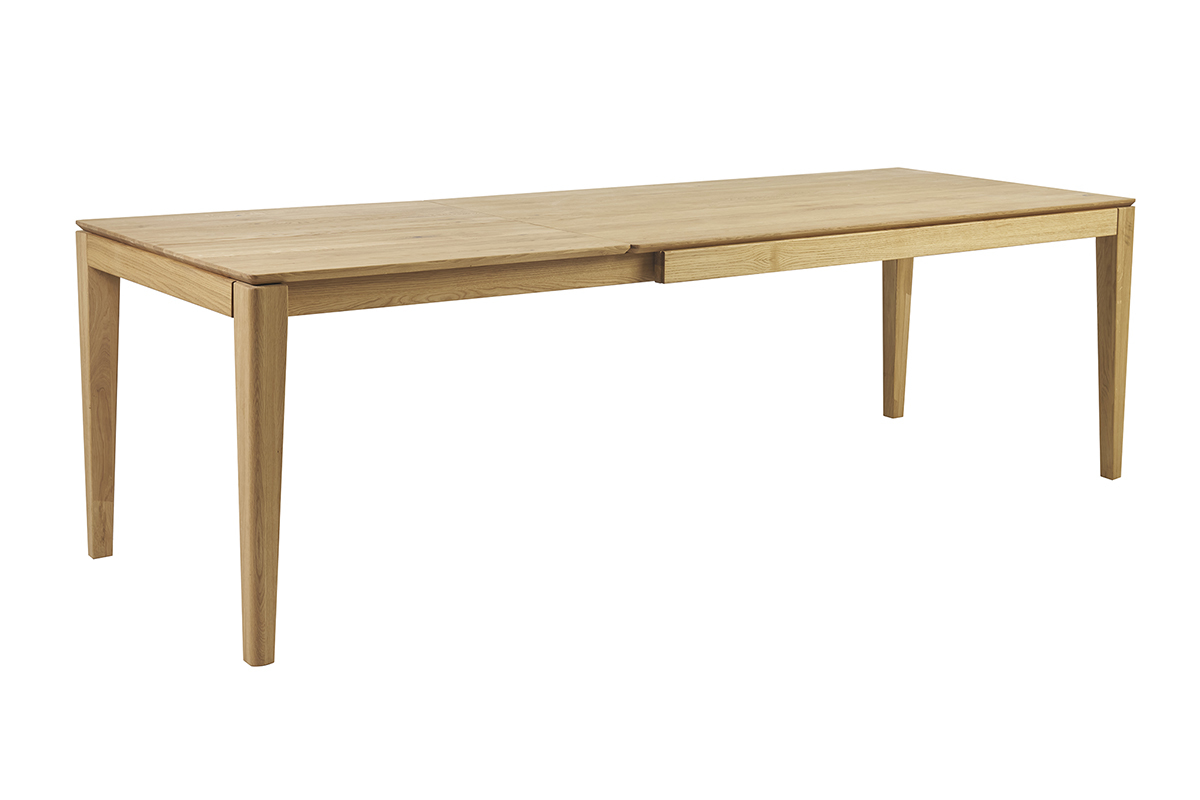 Table � manger extensible en bois clair, vue 3/4.